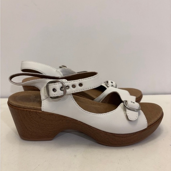 Dansko Joanie Sandals Women's 37 (6.5)
White Leather Ankle Strap Buckle Heels - Picture 1 of 9